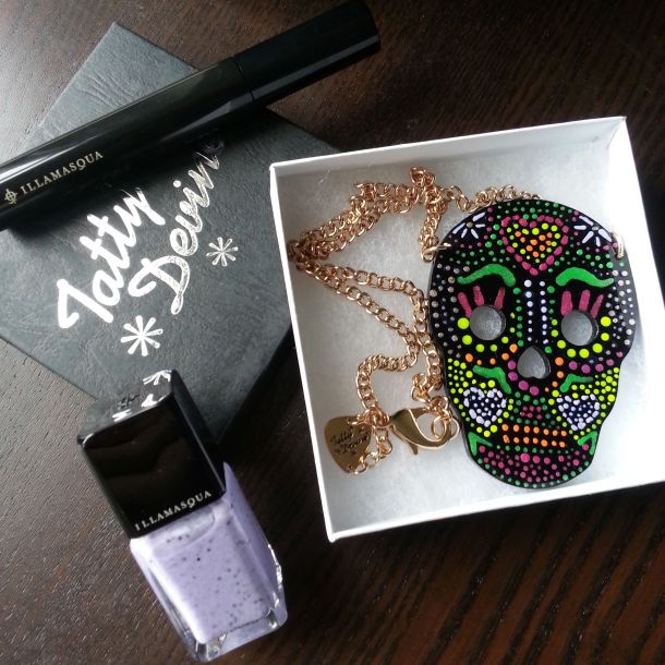 Illamasqua nail polish and mascara, Tatty Devine sugar skull necklace.