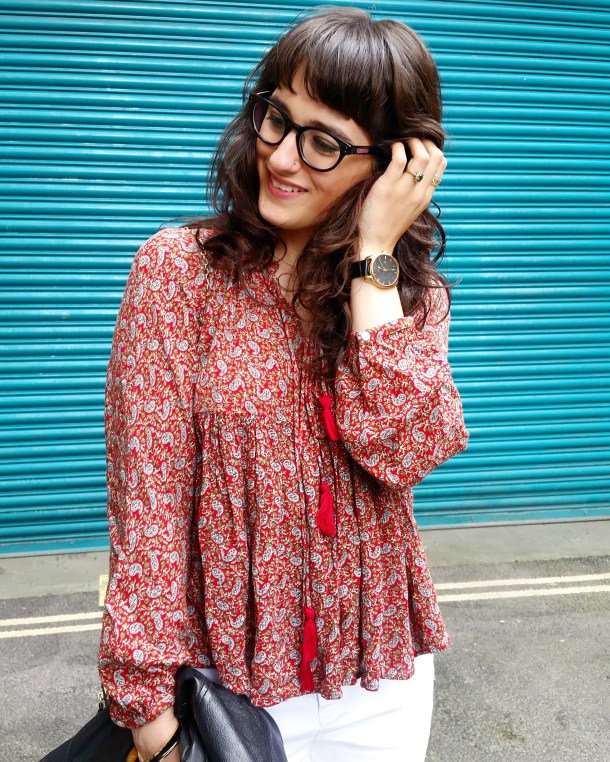 Call Me Katie - wearing white jeans, black leather jacket, heeled boots and red pompom tunic for weekend look 5