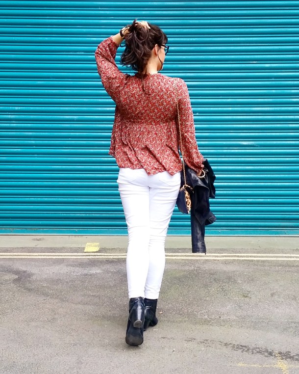 Call Me Katie - wearing white jeans, black leather jacket, heeled boots and red pompom tunic for weekend look 6